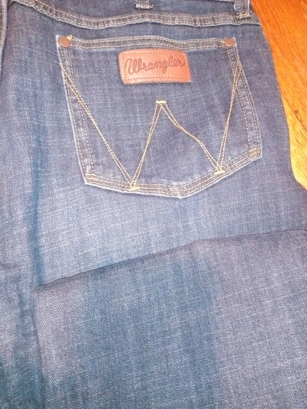 Wrangler Indigo Blue Denim Jeans with Leather Patch
